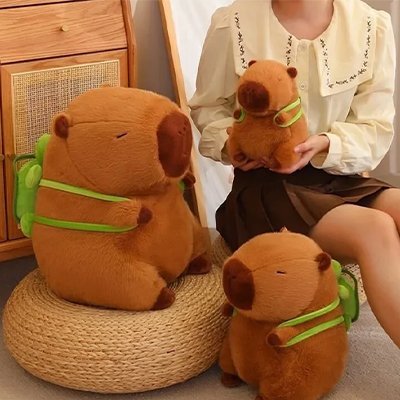 Peluche capybara | Ultra-douce bicolore avec poche ventrale intégrée